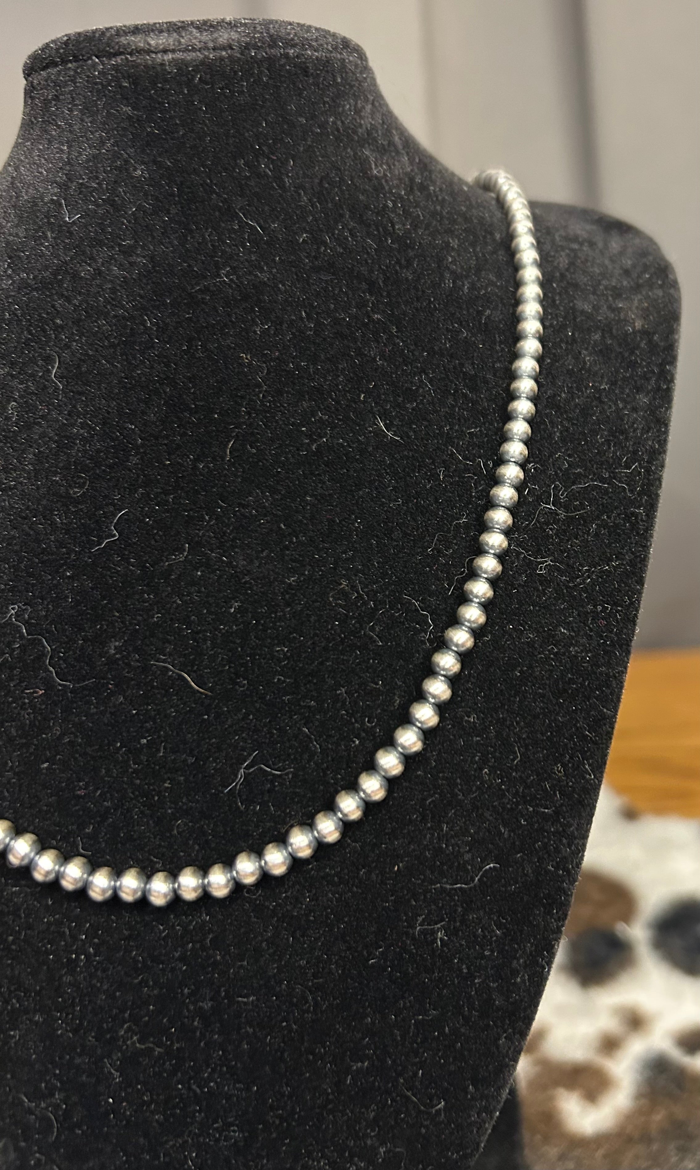 Sterling Silver Machine Made 4mm 20” Pearls on a 2 inch extender.