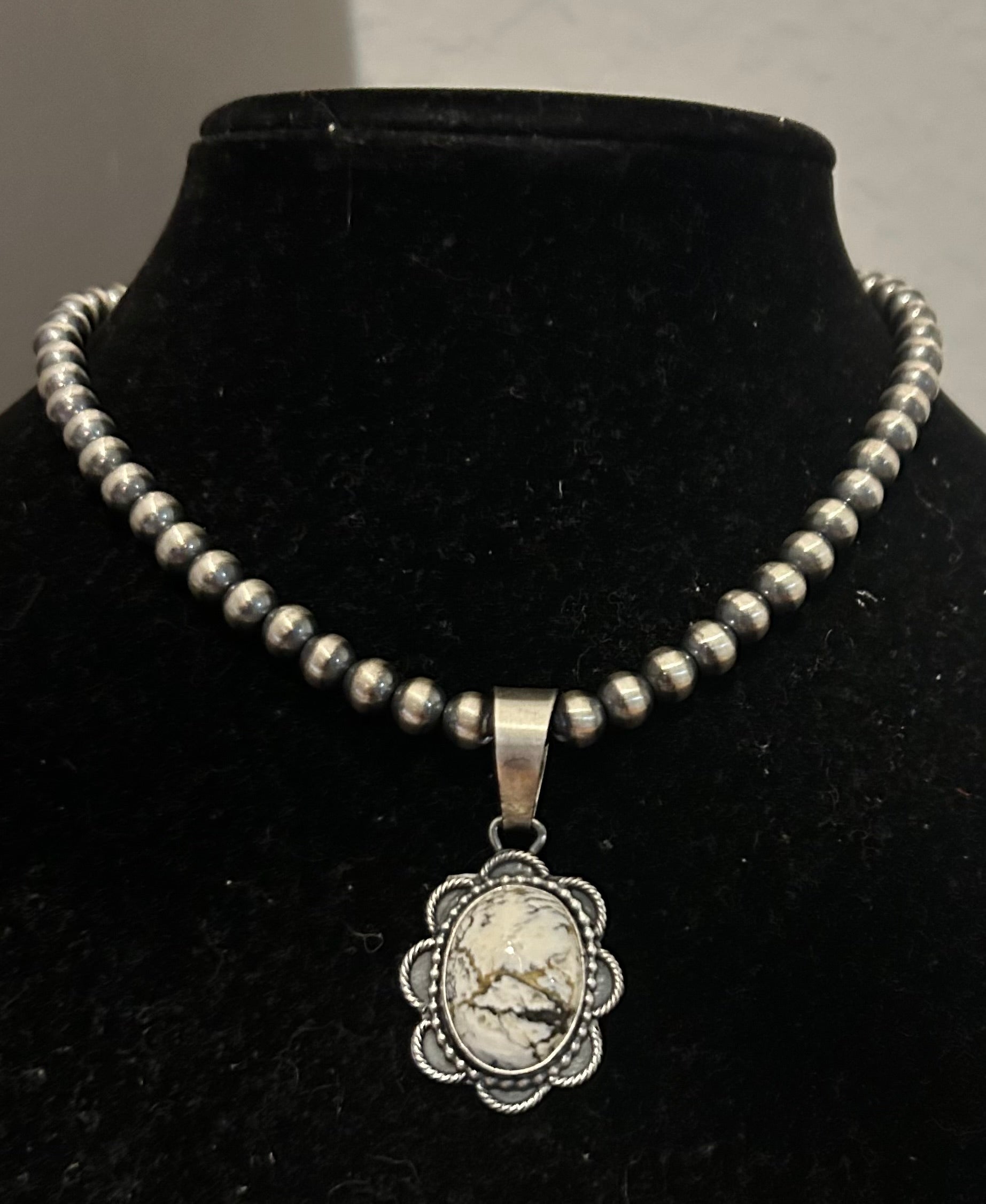 Navajo Handmade White Buffalo Pendant by Rena Shelly