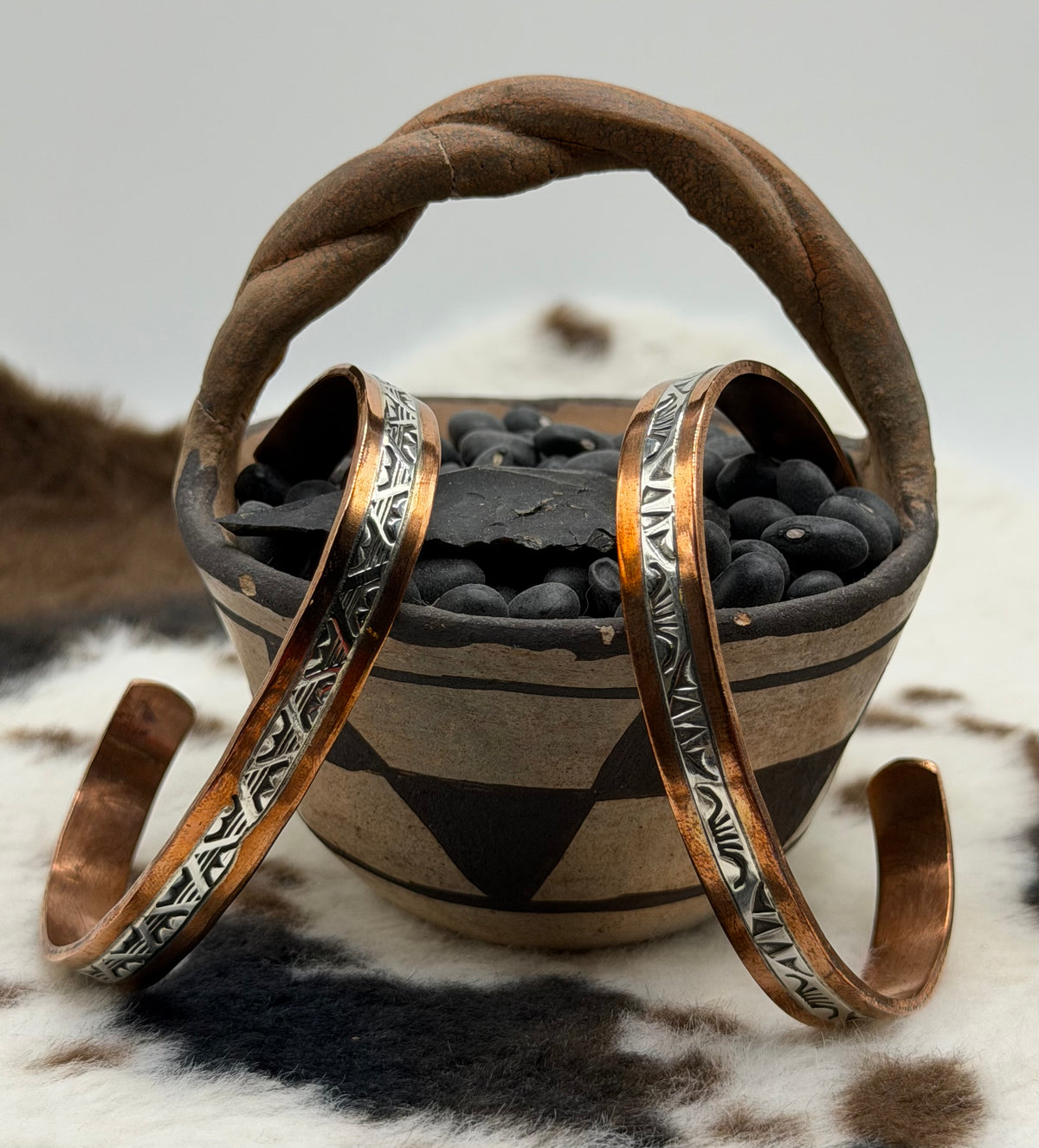 Navajo Handmade Sterling and Copper Cuff Bracelets by Wylie Secatero